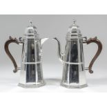 A George V silver octagonal coffee pot and matching hot water jug of "18th Century" design, of