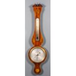 An early 19th Century mahogany wheel cased barometer and thermometer by I. Pensotti, High Street,