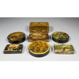 An early 19th Century Continental papier mache circular snuff box, the lid with image of mother,