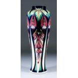A limited edition Moorcroft pottery vase, shape No. 121, tube lined and decorated in colours with "
