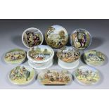 A collection of ten Victorian coloured potlids, including - potlid and marbled base printed in