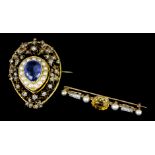 A Victorian gold coloured metal mounted set with central tear shaped sapphire, seed pearls and