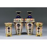 A pair of early 20th Century Royal Crown Derby bone china "Imari" pattern vases, 8ins high, (both