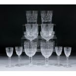 A cut glass part table service, comprising - twelve 4.125ins liqueur glasses, twelve 5ins wine