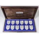 A set of twelve Elizabeth II silver shield ingots - "The Royal Arms Collection", each 2ins x 1.