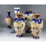 A pair of late 19th Century Doulton "Slaters Patent" stoneware vases (model Y428), the bodies with a