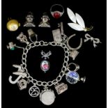 A modern silver curb link bracelet, 195mm overall, hung with fourteen charms (gross weight 2ozs) and