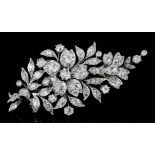 A late Victorian silvery coloured mounted all diamond set flower spray pattern brooch, the face with