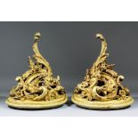 A pair of late 19th Century Continental gilt composition and wood wall brackets of rococo form,