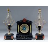 A late 19th Century French three piece clock garniture, the 3.5ins diameter wide silvered chapter