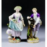A late 19th Century Meissen porcelain figure of a young woman holding a basket of flowers and