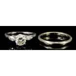 A modern platinum mounted diamond solitaire ring, the brilliant cut stone of approximately 1ct, with