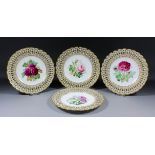 Four late 19th Century bone china plates, the centres painted with botanical specimens, the rims