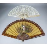 An early 20th Century golden silk fan painted with barefoot girl in undergrowth, signed "T.