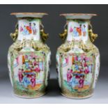 A pair of Chinese "Cantonese" porcelain two-handled vases enamelled in colours and gilt with