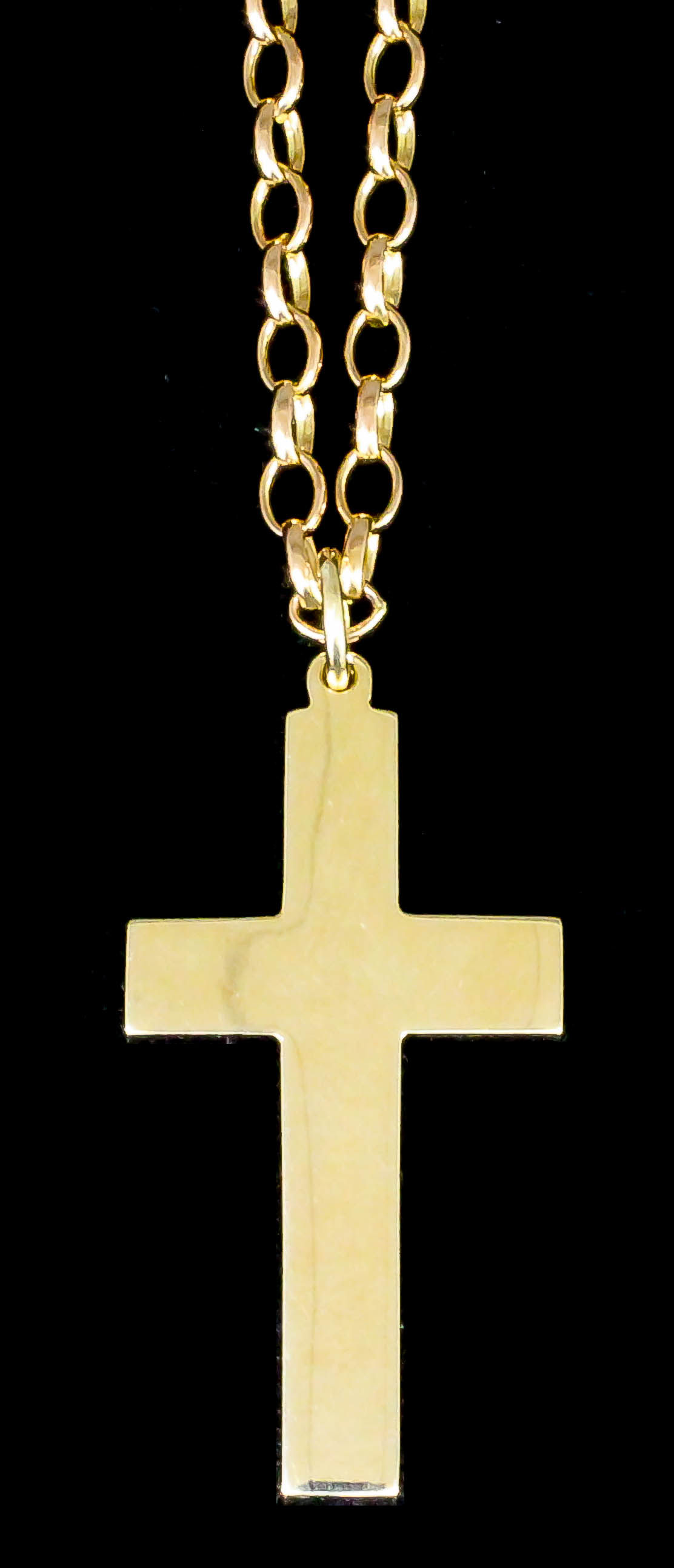 A modern 9ct gold cross pattern pendant, 55mm x 30mm overall, on 700mm 9ct gold chain link