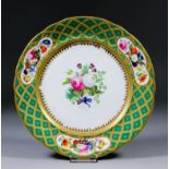 A Davenport Royal plate from the William IV dessert service, the centre enamelled with a bouquet