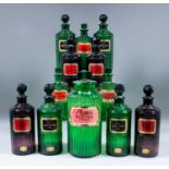 A collection of twelve late 19th/early 20th Century Chemists glass storage bottles, all with