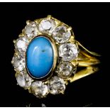 A Victorian 18ct gold mounted turquoise and diamond ring, the oval cabochon cut turquoise of