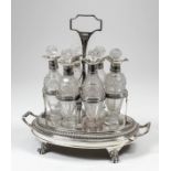 A good George III silver oval six-division cruet with moulded framework and rectangular loop handle,