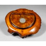 A Victorian briar root snuff box inlaid with circular silvery metal plaque to lid engraved "F.M",