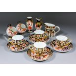 Four Royal Crown Derby porcelain "Imari" pattern teacups and saucers (pattern No. 2451), two similar