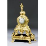 An 18th/19th Century ormolu watch holder containing an 18th Century watch movement by Thomas Wright,