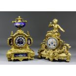 A late 19th Century French gilt spelter and porcelain mantel clock, the 3ins diameter blue and