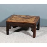 A Chinese rosewood rectangular coffee table with flush panel to top, with shaped apron and on square