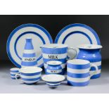 A collection of T.G. Green & Co blue banded "Cornish ware" pottery, including - vinegar bottle, 8ins