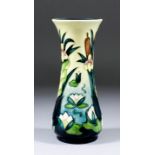 A Moorcroft pottery vase, shape No. 364, tube lined and decorated in colours with "Lamia" design,