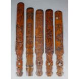 A collection of Japanese and Chinese bamboo carved page turners, including - Guanyin sitting in