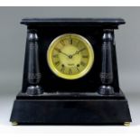 A 19th Century French black marble cased mantel clock, No. 6674, the 5ins gilt dial with Roman