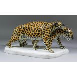 Etha Richter (1883-1977) - Porcelain model of two leopards, 8.5ins high, stamped "Etha Richter,