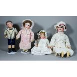 Four French SFBJ bisque headed dolls - "237" character child - Sailor boy, with open blue eyes, open