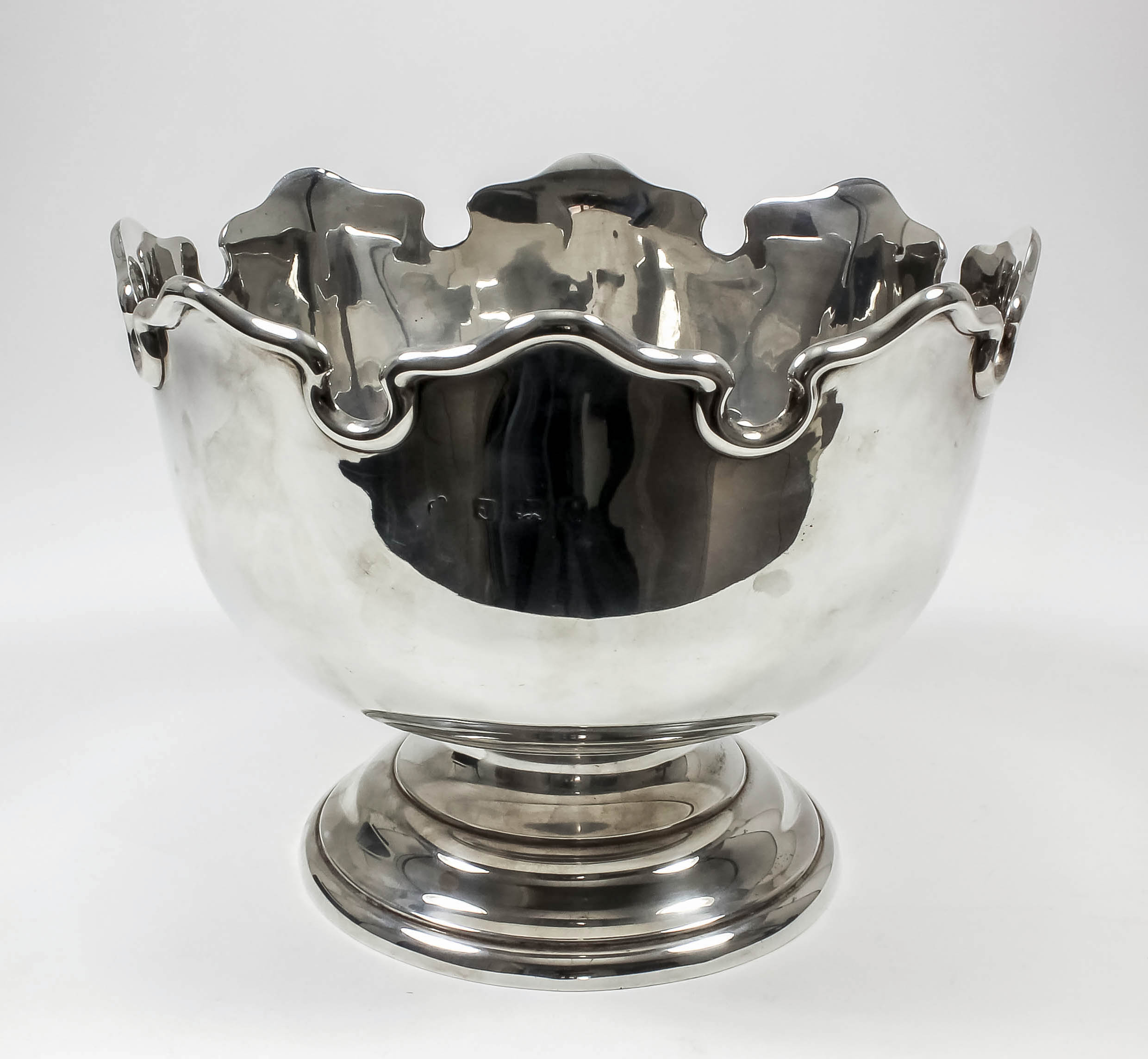 A George V silver Monteith pattern circular bowl with shaped and moulded rim, on circular footrim,