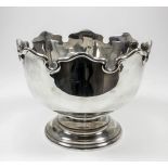 A George V silver Monteith pattern circular bowl with shaped and moulded rim, on circular footrim,