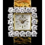 A modern lady's 18ct gold cased Baume and Mercier diamond set cocktail watch, the 10mm white