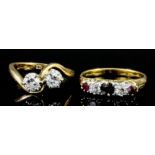 A mid-20th Century 18ct gold crossover ring with two old cut stones, each approximately .33ct (gross