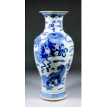 A Chinese blue and white porcelain baluster-shaped vase decorated with Kylin amongst clouds, in
