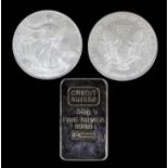 Fifteen USA 2005 silver Dollars (each 1oz fine silver), and three Credit Suisse 50 grammes silver