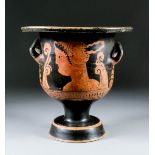 A Greek red figure terracotta krater decorated with the heads of a lady of fashion, 9ins diameter