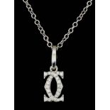 A modern Cartier 18ct white gold all diamond set interlinked C pattern pendant, the face set with