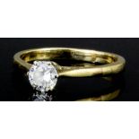 A modern 18ct gold mounted diamond solitaire ring, the brilliant cut stone of approximately .33ct (