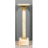 A 19th Century French cream veined alabaster and brass mounted square pedestal, on cylindrical