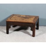A Chinese rosewood rectangular coffee table with flush panel top, with shaped apron and on square