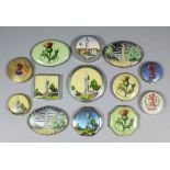 A small collection of 1938 Empire Exhibition painted and enamel compacts, various, together with a