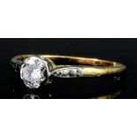 An Edwardian 18ct gold and platinum mounted diamond solitaire ring, the oval old cut stone of