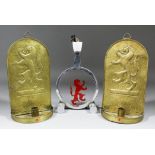 A pair of 1938 Empire Exhibition embossed brass wall candle sconces decorated with a rampant lion,