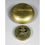 An early 20th Century brass circular ashtray, the hinged lid inscribed "Star Line First Class", 4